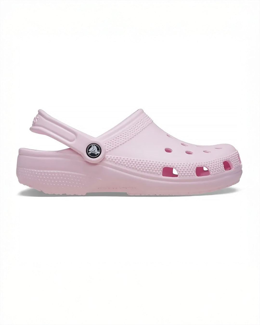 Sandália Crocs Classic Clog Pink Milk rosa claro em vista lateral com furos de ventilação e tira traseira com pino